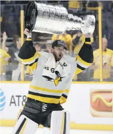  ?? THE CANADIAN PRESS/FILES ?? Pittsburgh Penguins goaltender Matt Murray has lifted the Stanley Cup above his head to end each of his first two seasons, but says he still isn’t the goaltender he believes he can become.