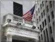  ?? SETH WENIG — THE ASSOCIATED PRESS FILE ?? The New York Stock Exchange is shown on Wall Street.