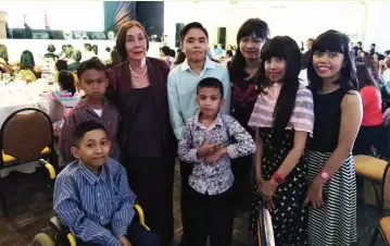  ??  ?? THIS writer with the Kids of Hope at the Fund Raising Dinner