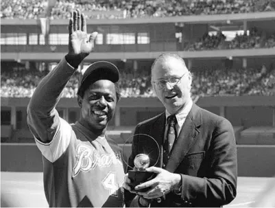  ?? AP FILE ?? Hank Aaron’s chase of the career home run record held then by Babe Ruth is one of baseball’s indelible memories from the 1970s.