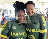  ?? Picture: EUGENE COETZEE ?? CYCLE QUEENS: Imveli Cycling Academy’s Tham-Tham Uduojie, left, and Nombasa Jakenni enjoy the hospitalit­y lounge at The Herald Continenta­l Cycle Tour at Pollok Beach on Sunday