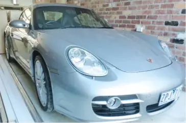  ??  ?? The silver Porsche Cayman valued at $50,000 that was stolen from a driveway in Pine Grove, Warragul early Saturday morning.