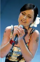  ?? (Reuters) ?? DOLORES O’RIORDAN performs at San Remo’s Song Festival in Italy in 2004.