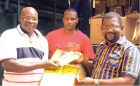  ??  ?? From left: Librarian, Nigerian Prisons Service (NPS), Iliya Haruna Goni, Assistant Librarian, Badamasi Hashim and Director Citizens United for the Rehabilita­tion of Errants (CURE), Sylvester Uhaa during the donation of books items to the Nigerian Prisons Service library for the inmate in Abuja at the weekend.