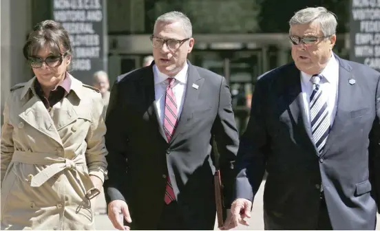  ?? AP ?? First lady Melania Trump’s parents, Viktor (right) and Amalija Knavs (left), have been sworn in as U.S. citizens.