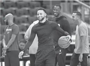  ?? NATHAN DENETTE/ AP ?? Stephen Curry and his Warriors teammates, shown in an NBA Finals practice in 2019, won’t have access to team facilities until at least June 1.