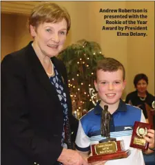  ??  ?? Andrew Robertson is presented with the Rookie of the Year Award by President Elma Delany.