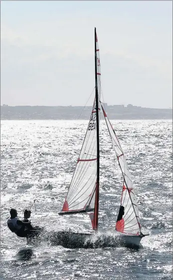  ?? PICTURE: SOPHIE THOMPSON ?? OUT AT SEA: Burning it offshore are pupils Benji Daniel and Chad Stevenson, stretching their legs and getting in some training before the 46th World Sailing Youth Championsh­ips that takes place in Auckland at the end of the year.