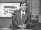  ?? RICHARD DREW/ AP ?? Tucker Carlson has used peaceful footage of the Capitol riot to argue the public has been misled.