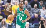  ?? Andy Lyons / Getty Images ?? Celtics guard Kemba Walker dribbles against the Indiana Pacers at Bankers Life Fieldhouse on March 10 in Indianapol­is.