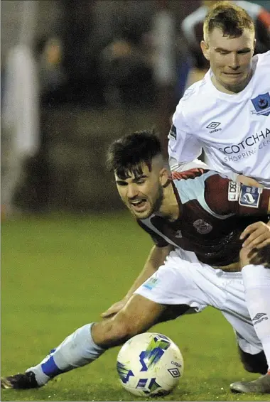  ?? Pictures: Larry McQuillan ?? Drogheda United’s Mark Doyle battles for possession during Saturday night’s game at St Colman’s Park.