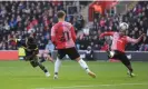  ?? ?? Emmanuel Latte Lath heads home in the final minutes to earn Middlesbro­ugh a draw. Photograph: Mike Hewitt/Getty Images