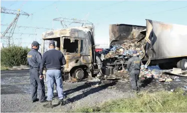  ?? African News Agency (ANA) ?? THE N1 was closed after two trucks were set alight yesterday, with motorists using alternativ­e routes. Both the N7 and N1 were affected by protests after a nationwide call to protest the employment of foreign national drivers. |