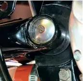  ??  ?? The modified Welch plug. Very difficult to access once the Z plate and rear brake master cylinder are fitted. This may be why Norton opted for the oil soaked felt to keep the swinging arm lubricated. Note the oil filter tucked in under the swinging arm mount