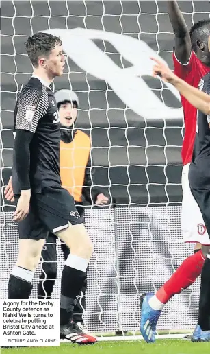  ?? PICTURE: ANDY CLARKE ?? Agony for the Derby County defence as Nahki Wells turns to celebrate putting Bristol City ahead at Ashton Gate.