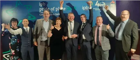  ??  ?? Committee members and local councillor­s celebrate the achievemen­t during the national awards ceremony.