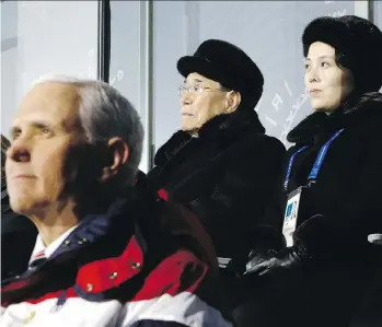  ?? PATRICK SEMANSKY/ AFP/GETTY IMAGES ?? U.S. Vice-President Mike Pence, front, watches the ceremonies. Kim Jong Un’s sister, Kim Yo-jong, is at back right.