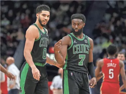  ?? CHUCK COOK/USA TODAY SPORTS ?? Jayson Tatum and Jaylen Brown are one win away from their first trip to the NBA Finals.