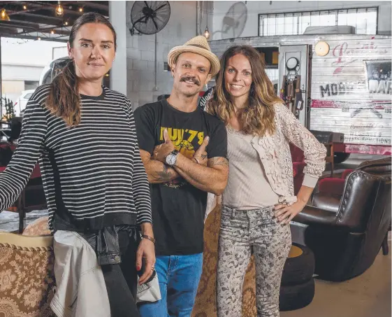  ?? Picture: JERAD WILLIAMS ?? Olivia Fischer, Joey D'adderio and Nicoletta Sagripanti’s Mobile Barber Shop Depot offers a haircut with a difference.