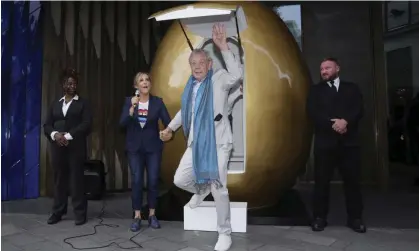  ?? ?? Yolking aside … Ian McKellen emerges, helped by Mel Giedroyc. Photograph: Scott Garfitt/Invision/AP