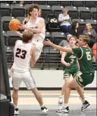  ?? ?? Blackhawk sophomore James Bledsoe, No. 22, led the scoring for the Blackhawks tuesday, Nov. 8, with 24 points in the game against alma. Junior Josh turner, No. 23, had 15 points.