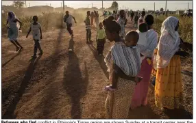  ?? (AP/Nariman El-Mofty) ?? Refugees who fled conflict in Ethiopia’s Tigray region are shown Sunday at a transit center near the Lugdi border crossing in eastern Sudan.