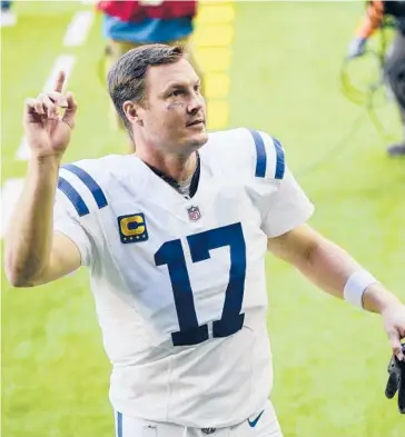  ?? DAVID J. PHILLIP/AP ?? In his first season with the Colts, veteran Pro Bowl QB Philip Rivers leads the team into the AFC playoffs.