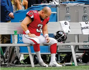  ?? CURTIS COMPTON / CCOMPTON@AJC.COM ?? Falcons kicker Matt Bryant, who had another missed field goal attempt during the game, sits dejectedly on the bench after losing 37-10 to the Rams on Sunday.