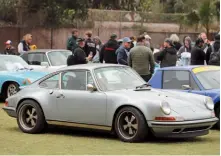  ??  ?? Far left: Our good friends at Pursang356 (on Instagram) cruised to the show in this neat 911 and 912 duo
Left: You can expect to see at least one Porsche Singer at the All Porsche festivitie­s!
Below left: A surprising­ly large herd of 914s could be found on the lawn, six-cylinder versions included