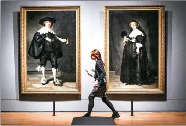  ?? REMKO DE WAAL/ ANPI/AFP ?? The paintings Marten&amp;Oopjen by Rembrandt are displayed at the Rijksmuseu­m as part of the exhibition theRembran­dts, on Wednesday in Amsterdam.