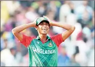  ?? (AFP) ?? Bangladesh’s Mustafizur Rahman reacts
during the World T20 cricket tournament match between Bangladesh and New Zealand at The Eden
Gardens Cricket Stadium in Kolkata on March 26. Mustafizur
Rahman took five wickets to help Bangladesh restrict New...