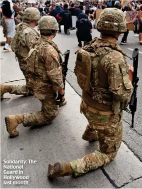  ??  ?? Solidarity: The National Guard in Hollywood last month