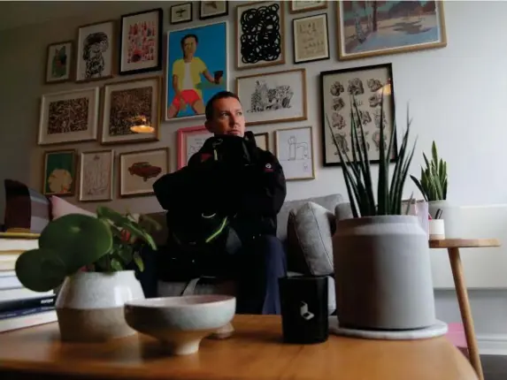  ??  ?? The illustrato­r at his home in east London (Jon Sharman/The Independen­t)