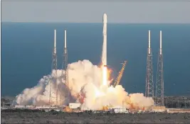  ?? Red Huber ?? Orlando Sentinel file A Spacex Falcon 9 rocket carrying a TESS spacecraft lifts off on April 18 at Cape Canaveral Air Force Station in Florida. TESS contains a telescope and camera that will hunt for undiscover­ed worlds around nearby stars.