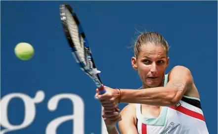  ??  ?? Shaky at the top: Karolina Pliskova of the Czech Republic returning a shot from Zhang Shuai of China in the third round on Saturday. — AP