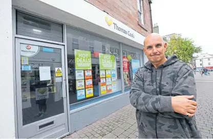  ?? Picture: Dougie Nicolson. ?? Former manager Stuart Betty outside the now closed Thomas Cook branch in Arbroath, all of whose staff lost their jobs when the firm went bankrupt on Monday.