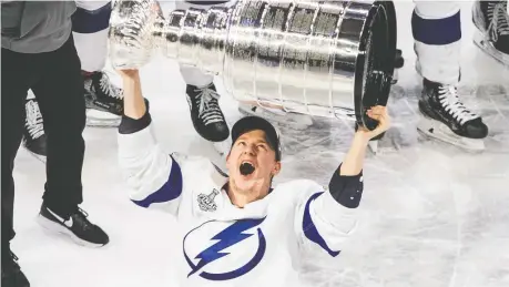  ?? JASON FRANSON/THE CANADIAN PRESS ?? The Tampa Bay Lightning defeated the Dallas Stars for the Stanley Cup in a year in which the NHL and owners spent millions to conclude a season filled with COVID-19 risks.