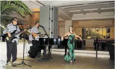  ?? Jeanne Cooper ?? Hula and Hawaiian music every night at sunset enhances the sense of place in the recently remodeled lobby lounge at the Four Seasons Maui.