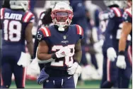  ?? Charles Krupa / AP ?? Back with the Patriots on a one-year deal, veteran RB James White is ready for a fresh start on and off the field.