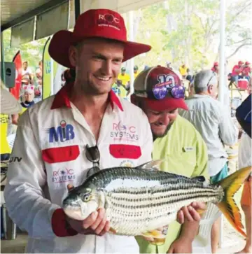  ??  ?? Mr Daniel Donohue of Team Hyana Sunrisers poses with his 6,17kg catch at the just-ended Kariba Invitation T iger Fish Tournament on Saturday. The tournament is one of the most popular fishing tournament­s in Southern Africa and by far the largest in Zimbabwe. It is also the largest single-species four -man fresh water fishing tournament in the world. It is held annually on the waters of Lake Kariba. This year the tournament celebrated 58 years of tiger fishing in Zimbabwe. The 2019 tournament ran from October 30 to November 1 at the National Anglers Union of Zimbabwe ( NAUZ) Charara Site