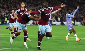  ?? Photograph: Chloe Knott/Danehouse/Getty Images ?? Kurt Zouma spreads his arms wide after scoring while Bournemout­h players appeal for handball against Thilo Kehrer.