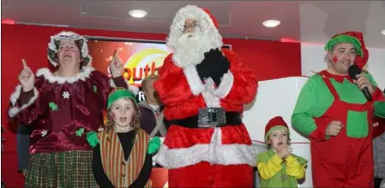  ??  ?? Mrs Claus, Santa Claus and the elves at the switching on of the Christmas Lights in the Market Square last year.