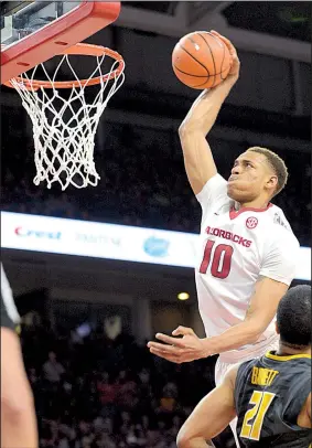  ?? NWA Democrat-Gazette/ANDY SHUPE ?? Arkansas freshman Daniel Gafford drives for a dunk during the second half of the Razorbacks’ victory over Missouri on Saturday at Walton Arena in Fayettevil­le. Gafford had 15 points and six rebounds as the Hogs ended their three-game losing streak.