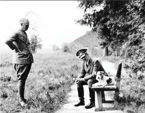  ?? GETTY IMAGES/FILES ?? Adolf Hitler, right, speaks with foreign minister Joachim von Ribbentrop while seated next to a wire-haired terrier at the Nazis’ eastern headquarte­rs in 1941. Years earlier von Ribbentrop had been living the high life in Ottawa.