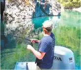  ??  ?? Kris Keyston casts for bass along a limestone outcrop near the headwaters of Shasta Lake, a great place for families to connect.