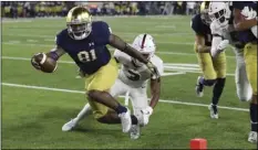  ??  ?? Notre Dame wide receiver Miles Boykin (81) beats Stanford safety Malik Antoine (3) for a touchdown during the second half of an NCAA college football game on Saturday, in South Bend, Ind. AP PHOTO/CARLOS OSORIO