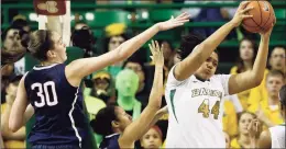  ?? Tony Gutierrez / AP ?? UConn’s Breanna Stewart (30) competes for a rebound against Baylor’s Kristina Higgins in the first half in 2014 in Waco, Texas.