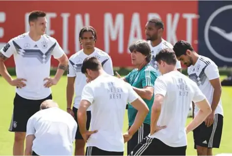  ?? AFP ?? Germany coach Joachim Loew speaks to his team prior to a training session at the Rungghof training center in Girlan, near Bolzano northern Italy yesterday.