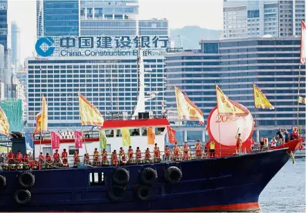  ?? — Reuters ?? Grand entrance: Performers sailing on a decorated ship near the area where ceremonies marking the 20th anniversar­y of the city’s handover from British to Chinese rule are taking place in Hong Kong.