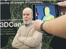  ?? TONY CALDWELL ?? Novelist and artist Douglas Coupland gets scanned in Ottawa as part of an art project. Coupland is coming to Calgary March 31.